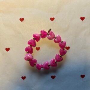 Kralenarmband hartjes roze